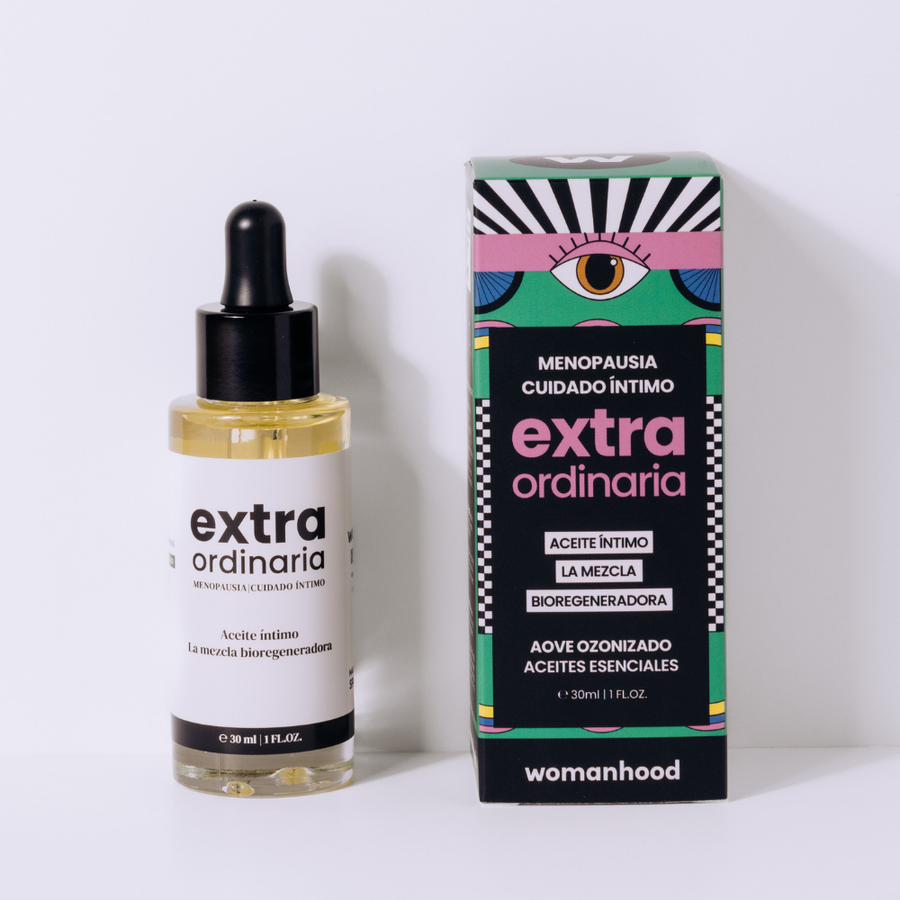 Aceite íntimo Extraordinaria de Womanhood junto a su caja